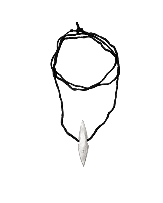 A black cord necklace with a polished silver pendant shaped like a stylized arrowhead, shown against a plain white background.