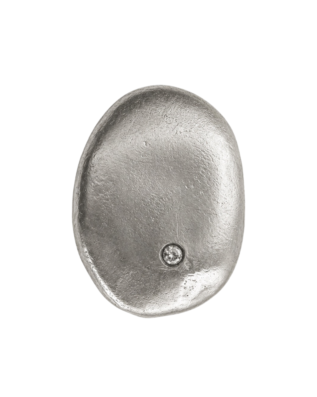 A single metallic oval pendant or medallion in a silver-toned finish, featuring a small circular inset detail near the lower right area, shown on a plain white background.