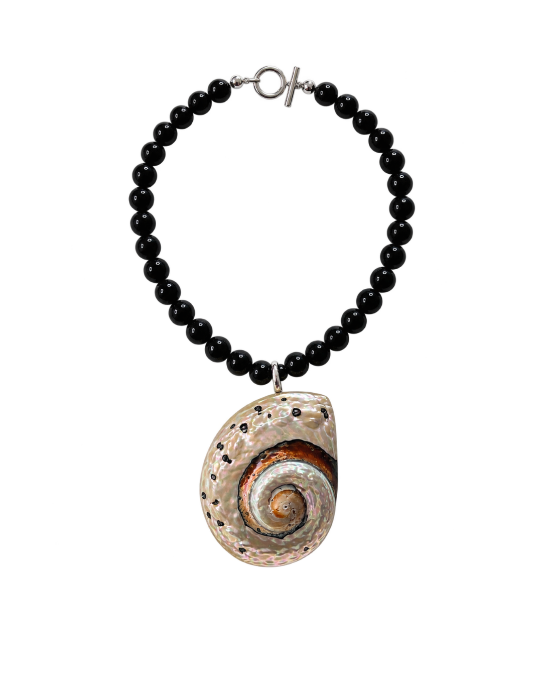 A beaded necklace featuring glossy black round beads and a large, teardrop-shaped natural abalone shell pendant with a spiral pattern of brown, orange, and cream tones, suspended from a silver toggle clasp on a plain white background.
